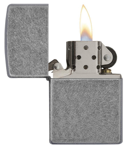 Classic Antique Silver Plate Windproof Lighter with its lid open and lit