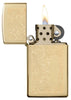 Slim High Polish Brass Venetian Windproof Lighter open and lit