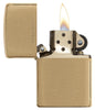 Classic Brushed Solid Brass Windproof Lighter with its lid open and lit