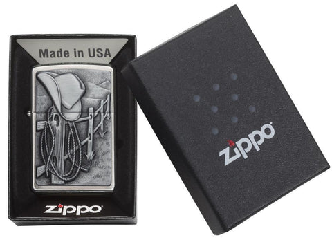 Resting Cowboy Windproof Lighter in its packaging
