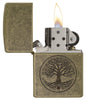 Tree of Life Antique Brass Windproof Lighter with its lid open and lit