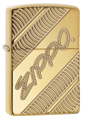 Front Shot of Zippo Coiled Deep Carve Engraving on a High Polish Brass Lighter standing at a 3/4 angle