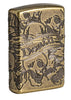 Armor® Antique Brass Skull Design Windproof Lighter standing at a 3/4 back angle