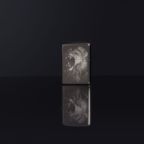 Lifestyle image of Lion Design Black Ice® Photo Image Windproof Lighter standing on a black surface, with the design reflecting off the ground.