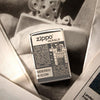 Zippo Newsprint Design Windproof Lighter on newspaper background
